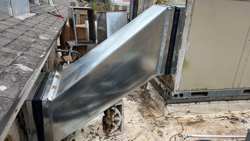 New sheet metal duct run on a commercial roof
