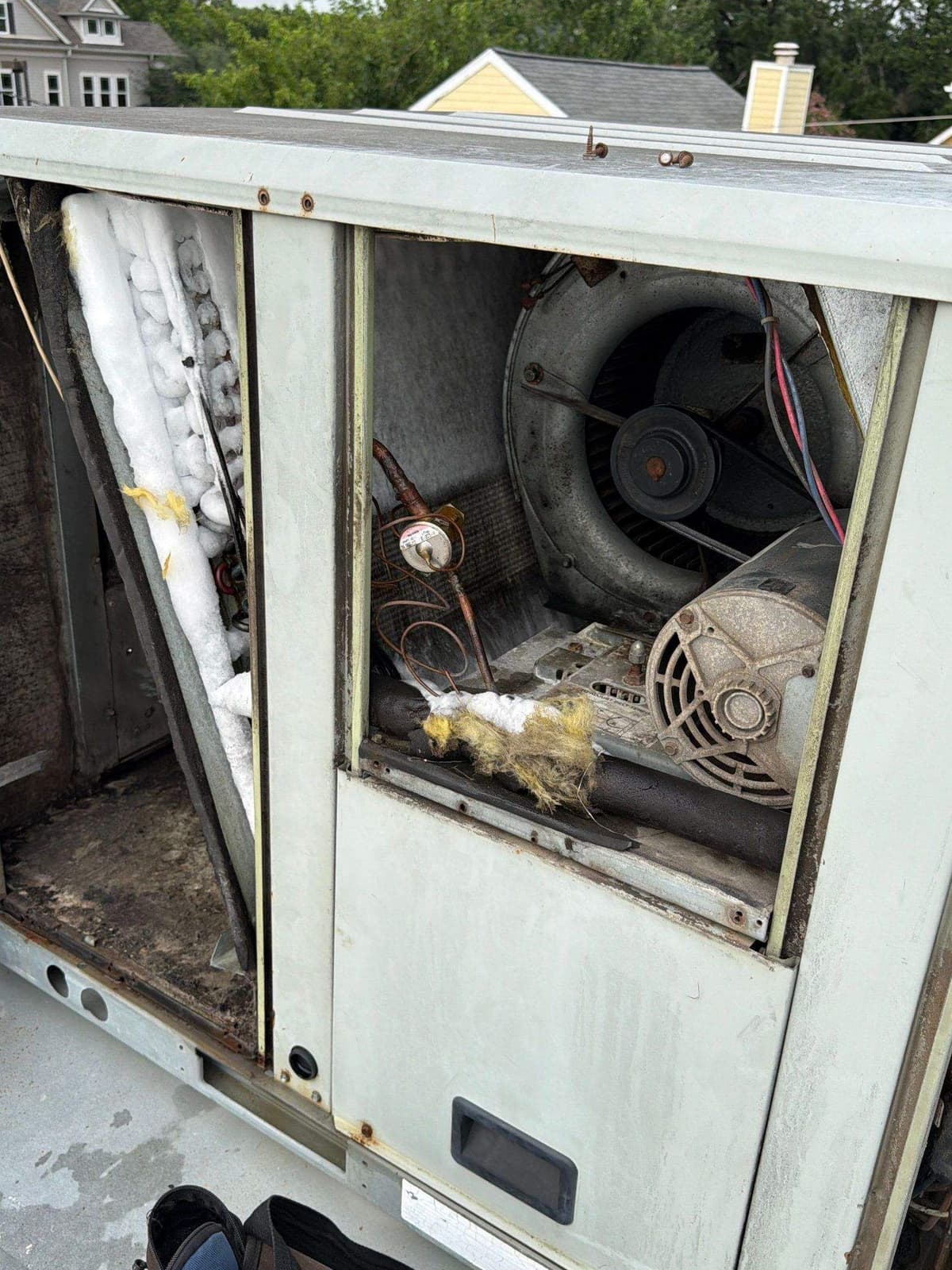 Rooftop package unit opened up for service