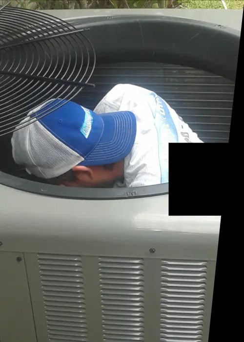 ColdSolutions technician servicing a commercial condensing unit